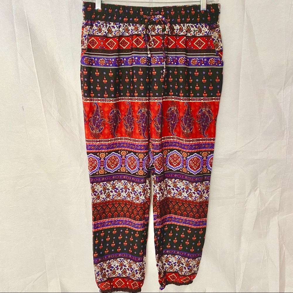 Floral soft flowy pattern pants cinched leg Size L